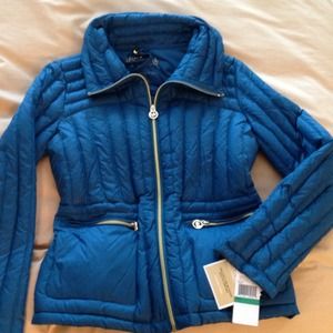 Genuine down filled Michael Kors coat.