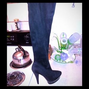 Knee high stiletto boots