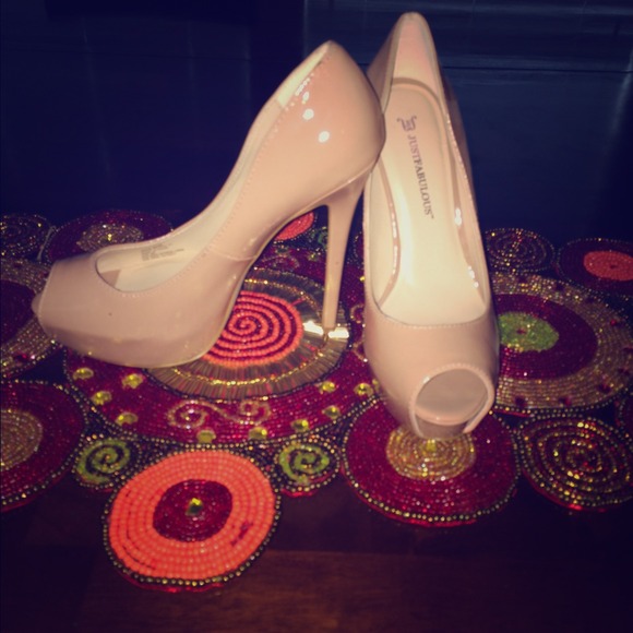 Nude patent pumps
