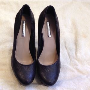 Faux snake skin black pumps. Never worn.
