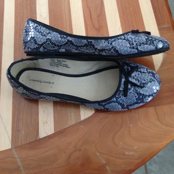 Black snake slip ons