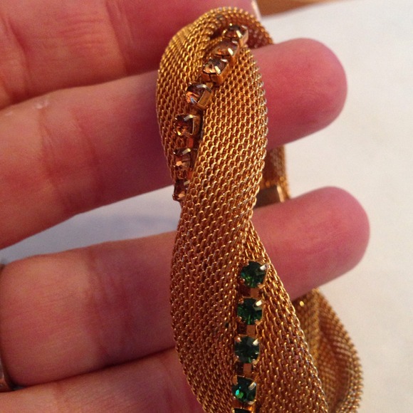 Gold bracelet with green & amber stones