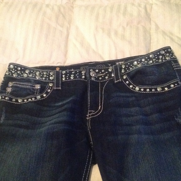 Dark wash Miss Me Jeans size 31.