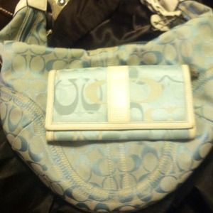 Sold locally..Authentic coach purse and wallet.