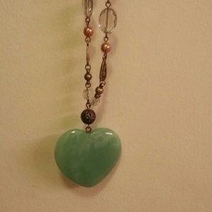 Jade like necklace. Very long. Super cute.