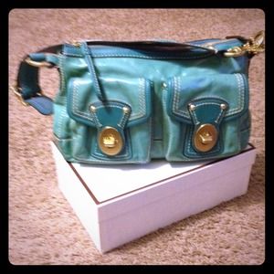 Patent leather aqua color Coach bag.