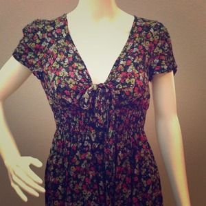 Black dress with red and green flower prints