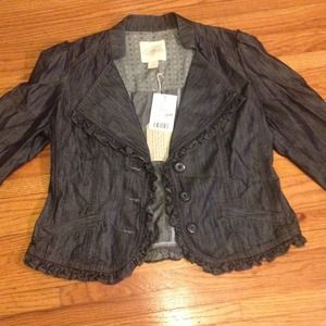 Denim blazer, ruffle accents. ANTHROPOLOGIE.