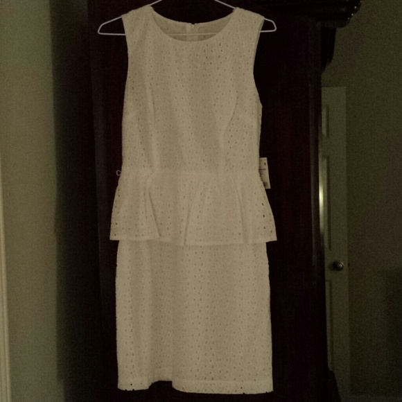 White embroidered eyelet peplum dress