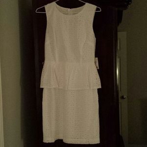 White embroidered eyelet peplum dress