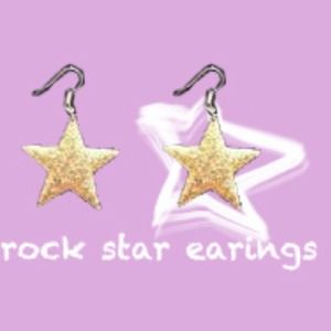 Gold star earings.