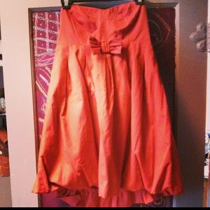 Heart shaped strapless balloon dress.