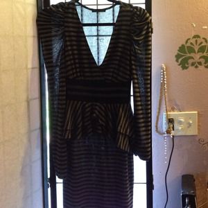 Striped form fitting peplum dress