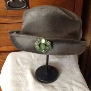 Pillbox hat with vintage pin.