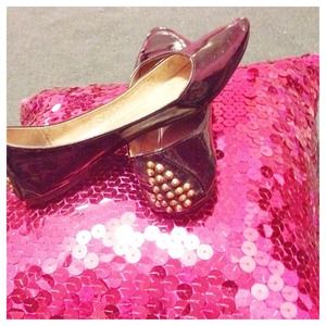 Pointy flats with gold studs in the back