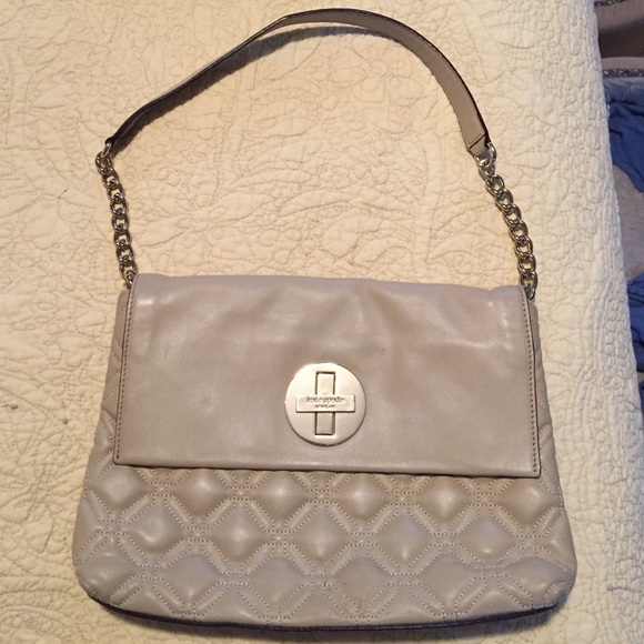 Kate spade Medium Size purse. Sits at your hip.