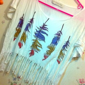 A crop too with feathers on the front
