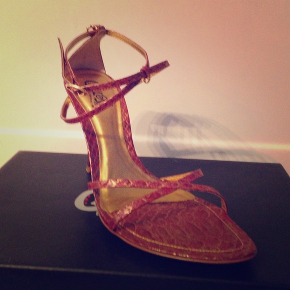 Pink snake print strappy sandal.