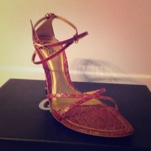 Pink snake print strappy sandal.