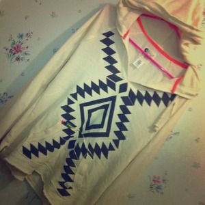 It a cute sweater with a hood!