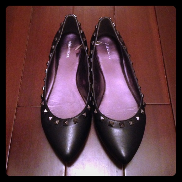 Black leather rockstud flats