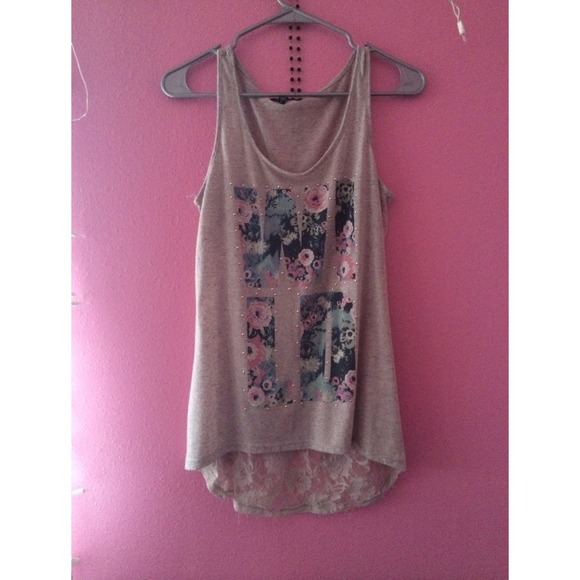 Floral wild top with 3/4 of lace on the back.