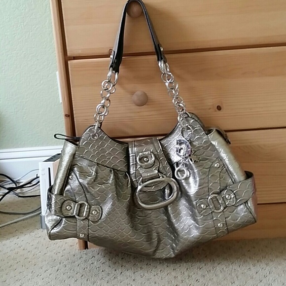 On Hold----Large silver Guess purse.