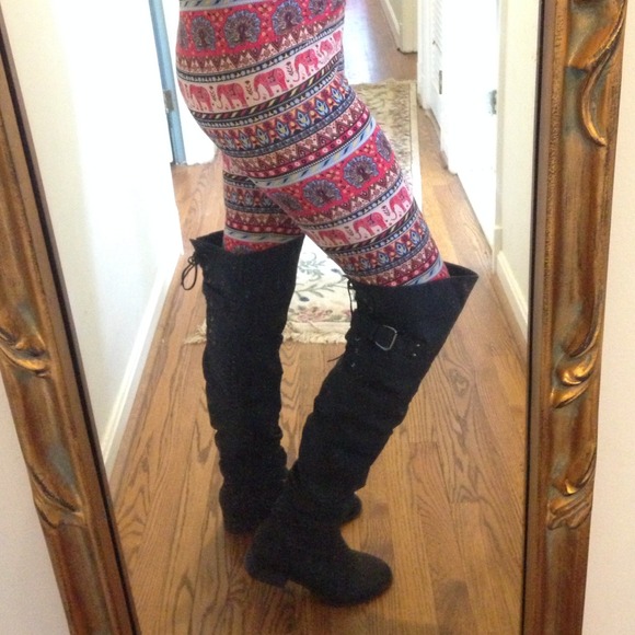 Thigh-high black boots