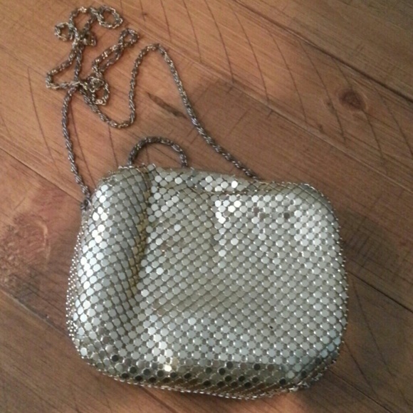 Shiny gold studded design clutch with strap