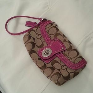 Authentic Coach magenta twist lock wristlet
