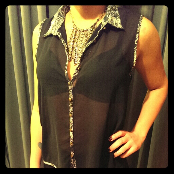 Sheer black sleeveless top w/ snake skin detailing