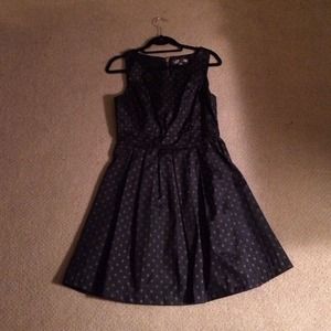 Shiny black flared dress