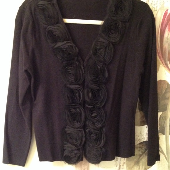 Black knit cardigan trimmed with chiffon rosettes