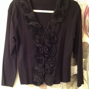 Black knit cardigan trimmed with chiffon rosettes