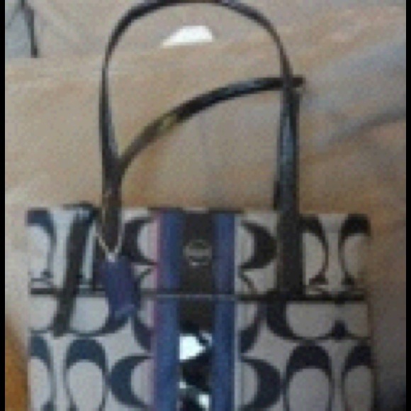 SOLD. Coach striped purse.  New never used