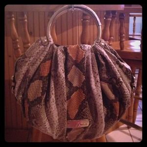 bundled Guess Marciano handbag and Xoxo Watch