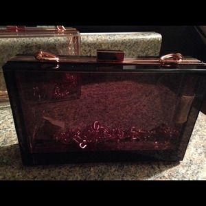 Brown  and store gold  clutch Nastygal....