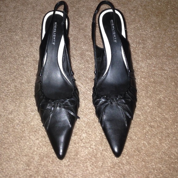 Highlights sling back heels.