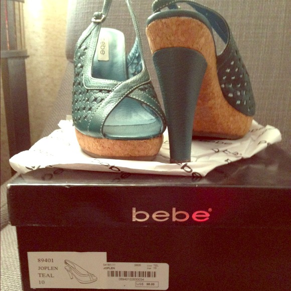 Bebe teal colored brand new cork heels.