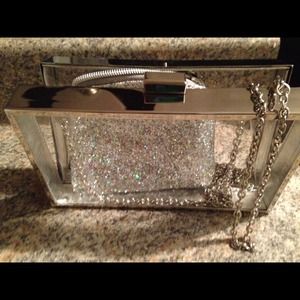 Clear and silver  Nastygal clutch