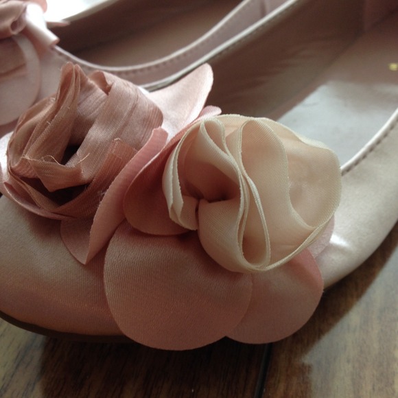 Light pink flats with flowers