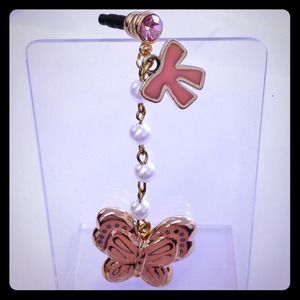 Cute pink butterfly with pretty pearls, bow, bling