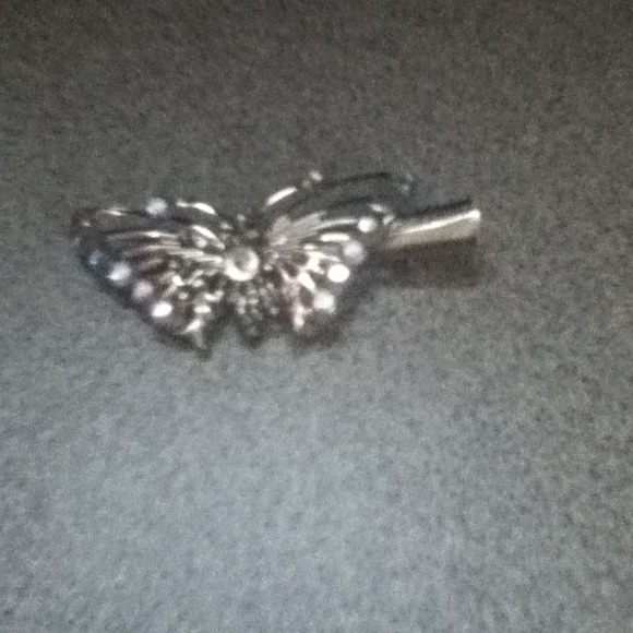 A silver butterfly hair clip