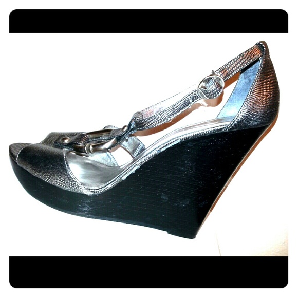 Pewter Calvin Klein leather open-toed wedges.