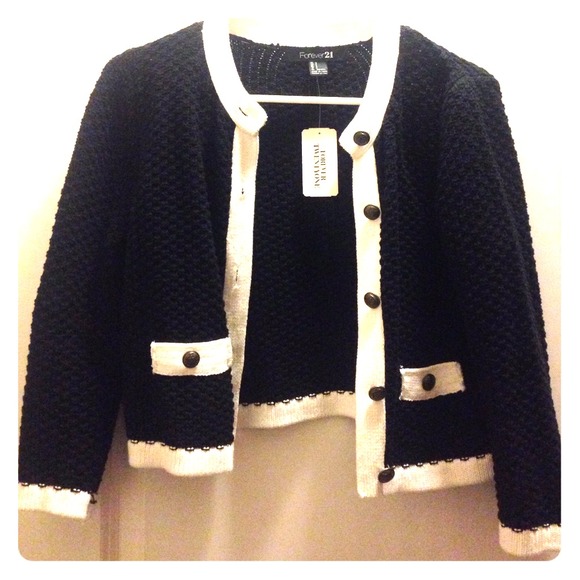 Brand new black and white crop cardigan.