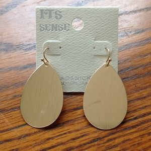Brand new flat gold earrings