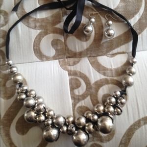 Silver necklace with matching earrings