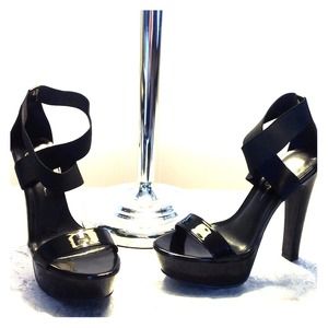 Black patent leather heels with elastic straps