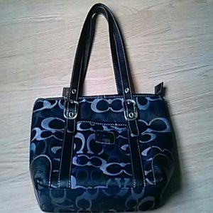 Black medium sized coach bag