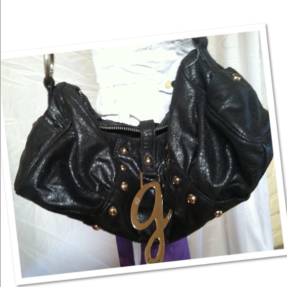Reserved bundle.. Guess.. Sm-med purse
